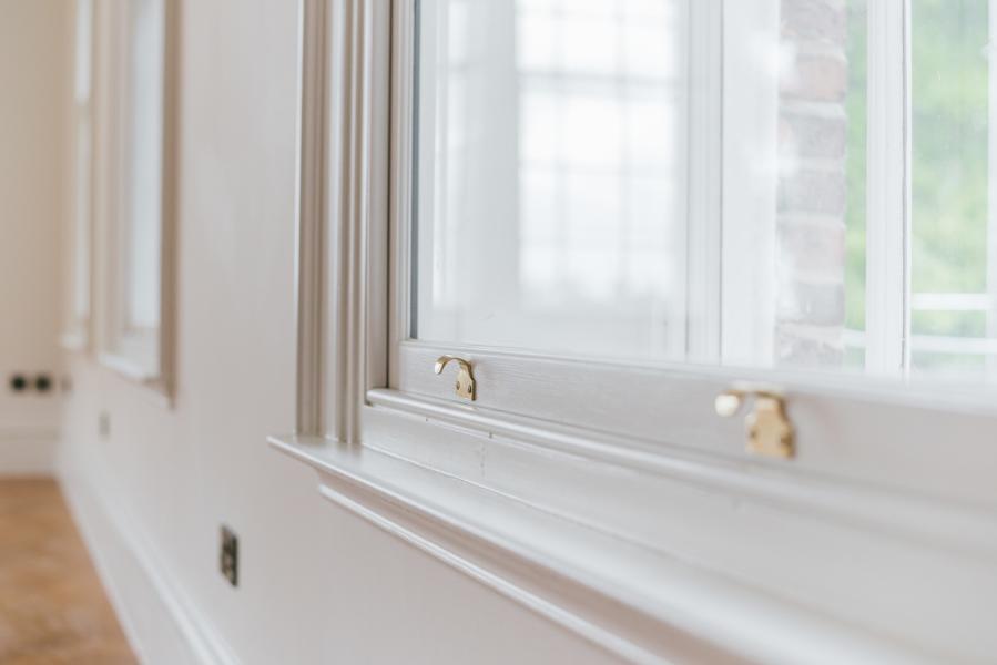Double-Hung Window Won’t Stay Open? Causes and Repair Options